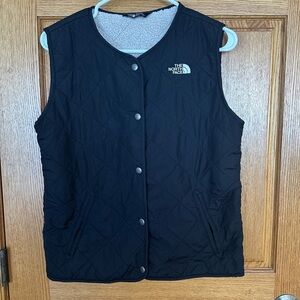 The NorthFace girls Sherpa lined vest. Size XL